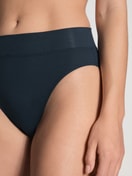 Women model is wearing High Waist Briefs, 2-Pack made of Cotton in Blue, Patterned from the Elastic Duopack series by CALIDA, Detail