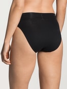 Women model is wearing High Waist Briefs, 2-Pack made of Cotton in Black, Unicoloured from the Elastic Duopack series by CALIDA, Back view