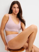 Women model is wearing Brief made of Modal in Purple, Unicoloured from the Natural Skin series by CALIDA, Additional Image