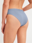 Women model is wearing Brazilian Brief made of Modal in Blue, Lace from the Etude Ajours series by CALIDA, Back view
