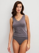 Women model is wearing Brief, regular cut made of Cotton in Brown, Lace from the Natural Comfort Lace series by CALIDA, Outfit