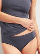 Women model is wearing Brief, regular cut made of Cotton in Grey, Unicoloured from the Essential Cotton series by CALIDA, Detail