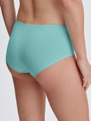 Damen-Model trägt Panty, low cut aus Baumwolle in Türkis, Einfarbig aus Serie Nat. Comfort Xtra von CALIDA, Rückansicht