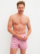 Men model is wearing Boxer shorts made of Cotton in Red, Patterned from the Valentine series by CALIDA, Outfit