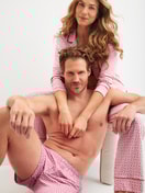 Men model is wearing Boxer shorts made of Cotton in Red, Patterned from the Valentine series by CALIDA, Additional Image