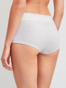Le mannequin Femme porte le/la Panty taille haute en Coton de couleur Blanc, Unicolore, de la série Elastic Special de CALIDA, Vue arrière