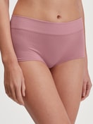 Women model is wearing Shorty regular cut made of Cotton in Pink, Unicoloured from the Elastic series by CALIDA, Front view