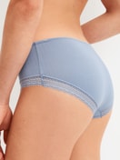 Women model is wearing Shorty made of Modal in Blue, Lace from the Etude Ajours series by CALIDA, Detail