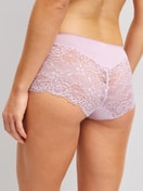 Women model is wearing Shorty regular cut made of Polyamide in Pink, Lace from the Sensual Secrets series by CALIDA, Back view