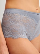 Women model is wearing Shorty regular cut made of Lace in Grey, Lace from the Sensual Secrets series by CALIDA, Detail