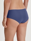 Women model is wearing Panty made of Modal in Blue, Unicoloured from the Natural Skin series by CALIDA, Back view