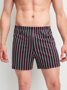 Men model is wearing Boxer Shorts, 2-Pack made of 100% Cotton in Black, Striped from the Cotton Special series by CALIDA, Front view