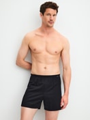 Men model is wearing Boxer Shorts, 2-Pack made of 100% Cotton in Black, Striped from the Cotton Special series by CALIDA, Additional Image