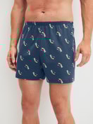 Men model is wearing Boxer shorts made of Cotton in Blue, Patterned from the Prints series by CALIDA, Front view