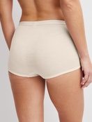 La modella / Il modello Donna indossa Slip in lana-seta in Lana di colore Beige, Tinta unita, della serie True Confidence di CALIDA, Vista posteriore