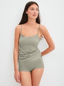 Women model is wearing Shorty regular cut made of Cotton in Green, Unicoloured from the Cate series by CALIDA, Outfit