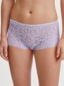 Women model is wearing Shorty regular cut made of Cotton in Purple, Lace from the Natural Comfort Lace series by CALIDA, Front view