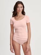 Women model is wearing Shorty regular cut made of Modal in Pink, Unicoloured from the Soft Favourites series by CALIDA, Outfit