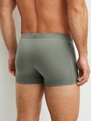 Men model is wearing Boxer brief made of Cotton in Green, Unicoloured from the Evolution series by CALIDA, Back view