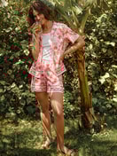 Women model is wearing Pyjama shorts made of 100% Cotton in Orange, Floral from the Favourites Beach series by CALIDA, Additional Image
