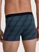 Herren-Model trägt Boxer Brief mit Softgummibund aus Baumwolle in Schwarz, Gemustert aus Serie Grafic Cotton von CALIDA, Rückansicht