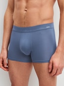 Men model is wearing Boxer brief with Quick Dry Effect made of Modal in Blue, Unicoloured from the Balanced Day series by CALIDA, Front view