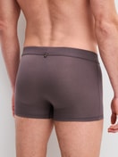 Men model is wearing Boxer brief with Quick Dry Effect made of Modal in Brown, Unicoloured from the Balanced Day series by CALIDA, Back view