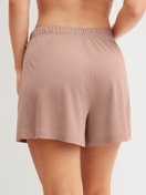 Damen-Model trägt Loungeshorts aus Modal in Braun, Einfarbig aus Serie Natural Loungewear von CALIDA, Rückansicht