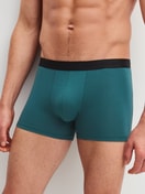 Men model is wearing Boxer Briefs, 3-Pack made of Cotton in Turquoise, Striped from the Natural Benefit series by CALIDA, Front view