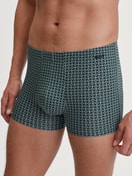 Men model is wearing Boxer brief made of TENCEL™ in Green, Patterned from the Focus Trend series by CALIDA, Front view