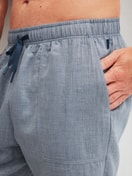 Le mannequin Homme porte le/la Bermuda avec poches latérales en 100% coton de couleur Gris, Unicolore, de la série RMX Sleep Journey de CALIDA, Détail