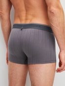 Men model is wearing Boxer brief, elastic waistband made of Cotton in Grey, Unicoloured from the Pure & Style series by CALIDA, Back view
