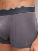 Men model is wearing Boxer brief, elastic waistband made of Cotton in Grey, Unicoloured from the Pure & Style series by CALIDA, Detail