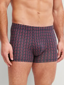 Men model is wearing Boxer brief made of Pima® Cotton in Grey, Patterned from the Grafic Cotton series by CALIDA, Front view