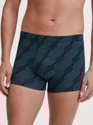 Men model is wearing Boxer brief made of Cotton in Black, Patterned from the Grafic Cotton series by CALIDA, Front view