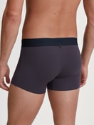 Herren-Model trägt Boxer Brief mit Softbund aus TENCEL™ in Blau, Einfarbig aus Serie Clean Line von CALIDA, Rückansicht
