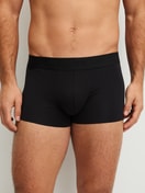 Men model is wearing Boxer brief with elastic waistband made of Modal in Black, Unicoloured from the Clean Line series by CALIDA, Front view