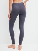 Women model is wearing Leggings made of Cotton in Grey, Unicoloured from the Elastic series by CALIDA, Back view