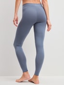 Women model is wearing Leggings made of Cotton in Grey, Unicoloured from the Elastic series by CALIDA, Back view