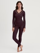 Women model is wearing Leggings in Wool and Silk made of Wool in Red, Lace from the Silky Wool Joy series by CALIDA, Outfit