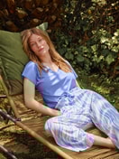 Women model is wearing 7/8 pyjama trousers made of Cotton in Blue, Patterned from the Favourites Ocean series by CALIDA, Additional Image