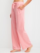 La modella / Il modello Donna indossa Pantaloni pigiama in Cotone di colore Arancione, A righe, della serie Favourites Beach di CALIDA, Vista frontale