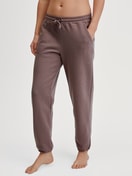 Damen-Model trägt Loungehose mit Seitentaschen aus Baumwolle in Braun, Einfarbig aus Serie Lounge Element von CALIDA, Vorderansicht