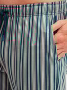 Men model is wearing Pyjama Bottoms with Side Pockets made of 100% Cotton in Green, Striped from the RMX Sleep Leisure series by CALIDA, Detail