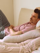 Men model is wearing Pyjama Bottoms with Side Pockets made of 100% Cotton in Green, Striped from the RMX Sleep Leisure series by CALIDA, Additional Image