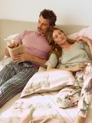 Men model is wearing Pyjama Bottoms with Side Pockets made of 100% Cotton in Green, Striped from the RMX Sleep Leisure series by CALIDA, Additional Image