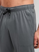 Men model is wearing Pyjama Bottoms with Side Pockets made of 100% Cotton in Grey, Unicoloured from the RMX Sleep Leisure series by CALIDA, Detail