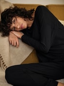 Women model is wearing Lounge trousers made of Modal in Black, Unicoloured from the Feminine Lounge series by CALIDA, Additional Image