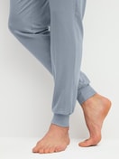 Men model is wearing Pyjama bottom with cuffs made of Lyocell in Grey, Unicoloured from the DSW Warming series by CALIDA, Detail