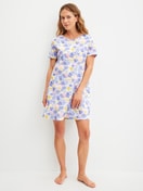 Women model is wearing Short-sleeved nightdress, length 95 cm made of 100% Cotton in Blue, Floral from the Coastal Dreams series by CALIDA, Front view